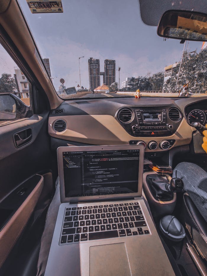 Computer Laptop on Car Passenger Seat